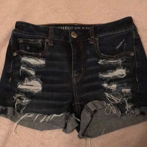 High rise dark wash destroyed shortie shorts